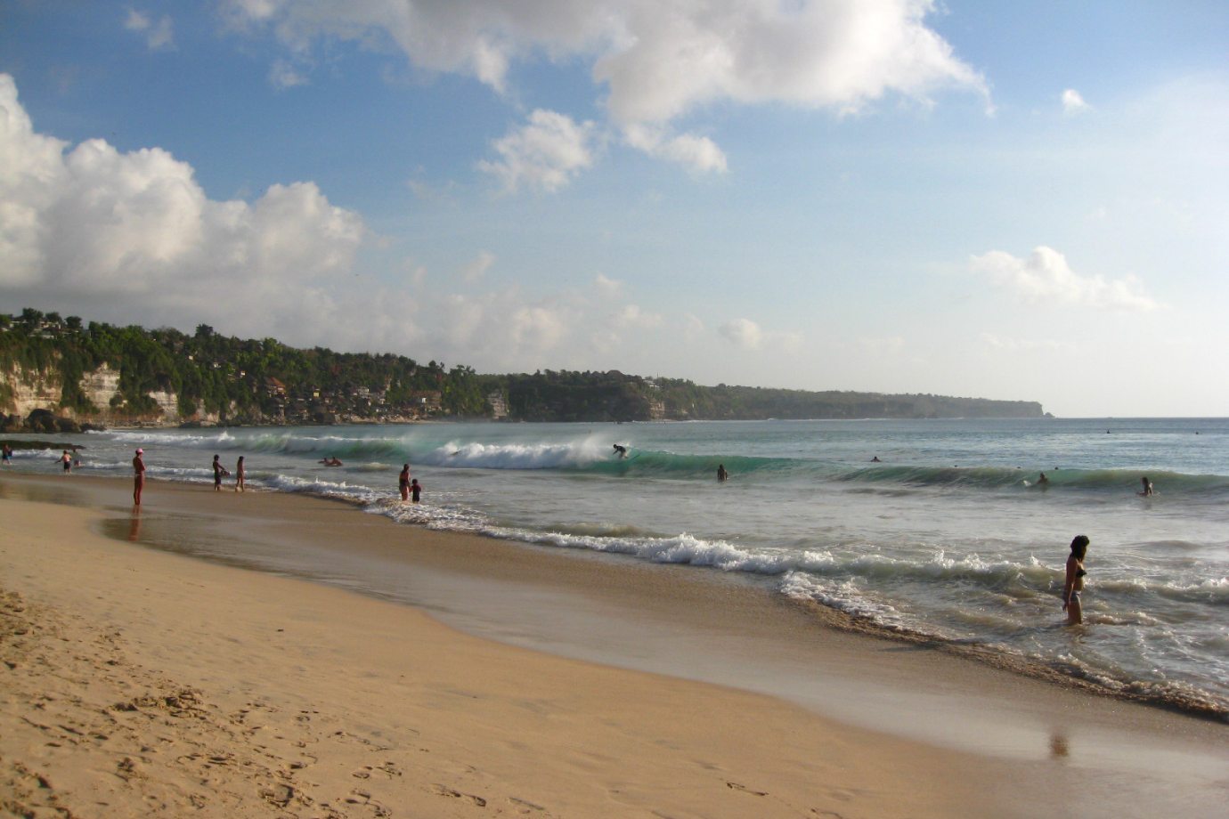 Surfing on the waves near Dreamland Beach