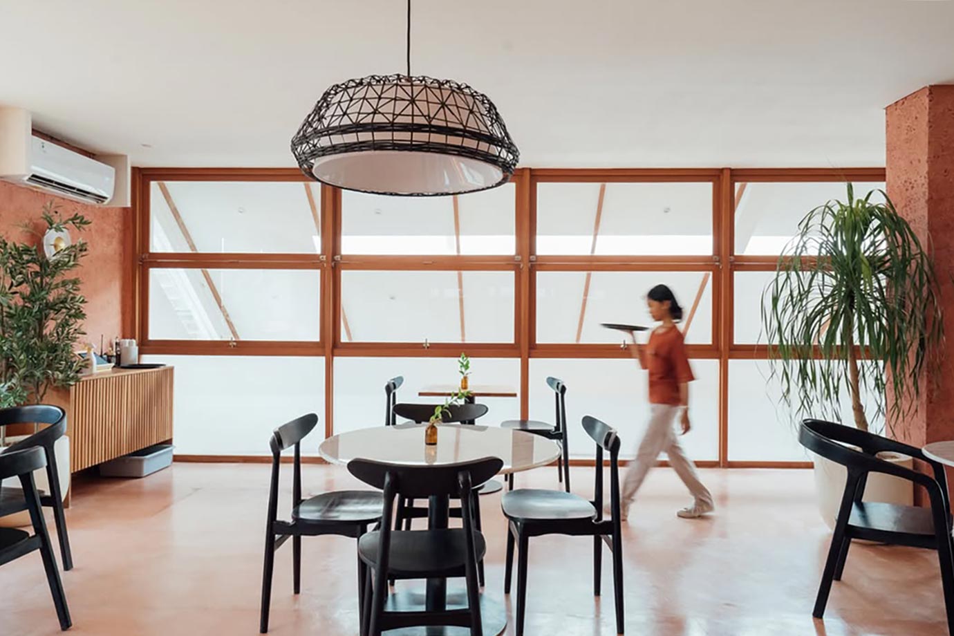 Waitress walking in Sala Ubud restaurant