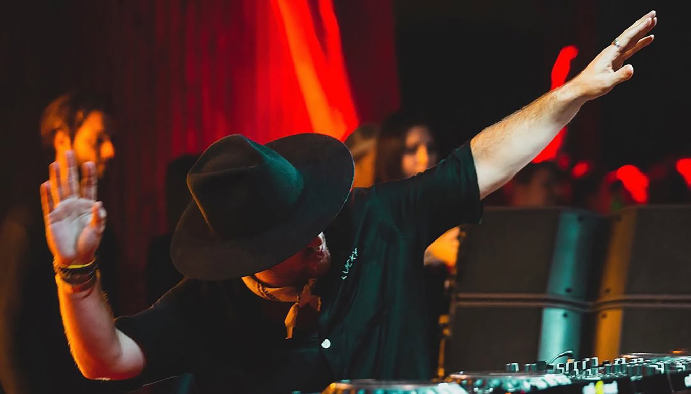 Apache playing at the DJ booth