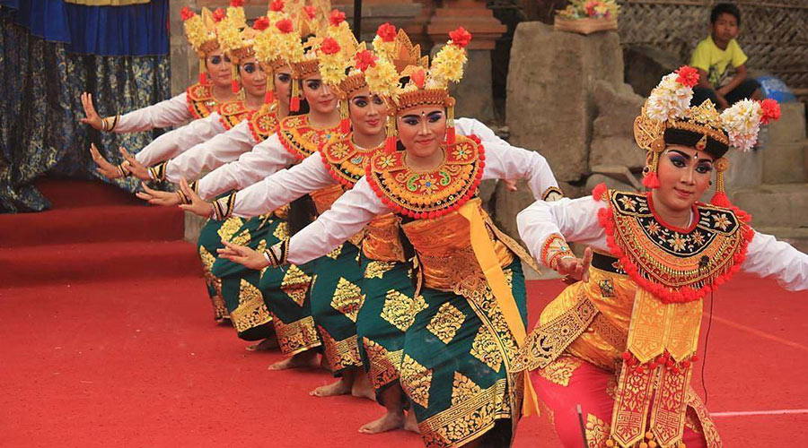 Women performs in costumes at Bali Arts Festival