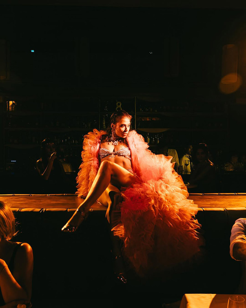La Joia woman dancing on the table