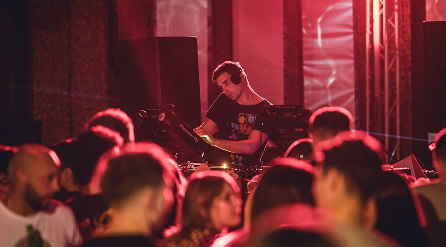 Cristi Cons on the stage of night club