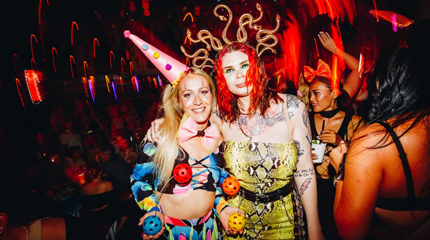 Girls in costumes at a Mexican Halloween party