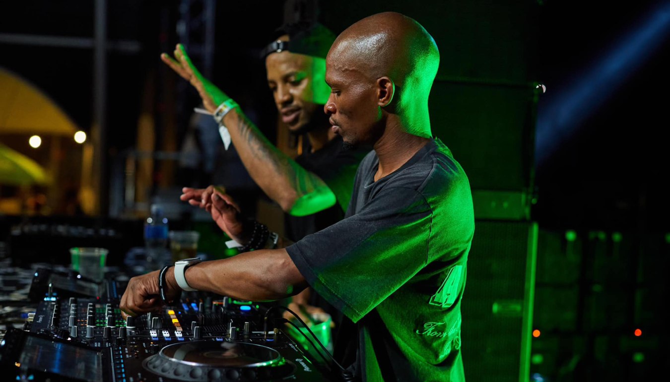 Enoo Napa with DJ console at the stage