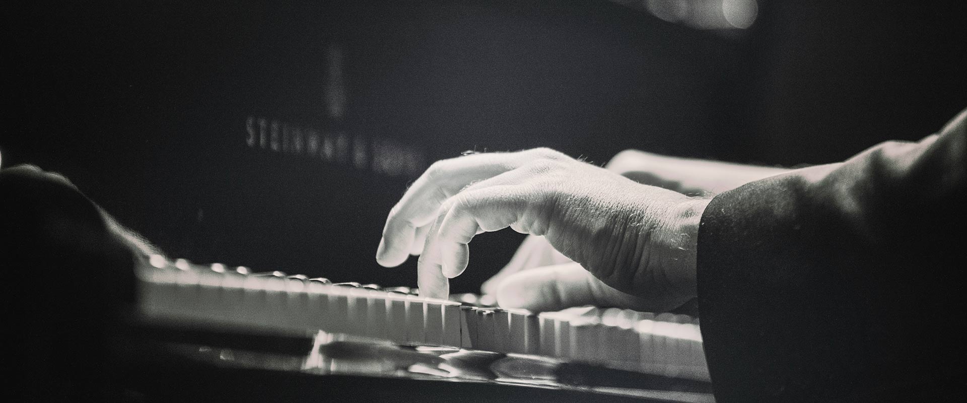 Background of Living Legacy Concert at Apurva Kempinski