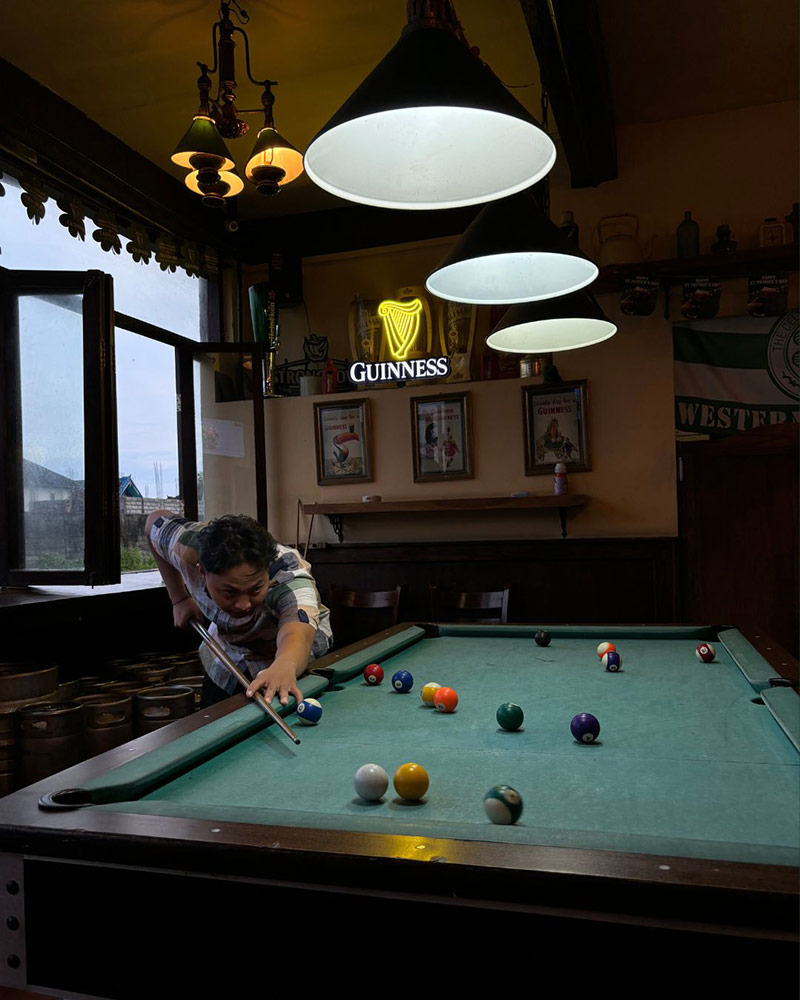 Playing billiards at Rosey Murphy's Irish Pub