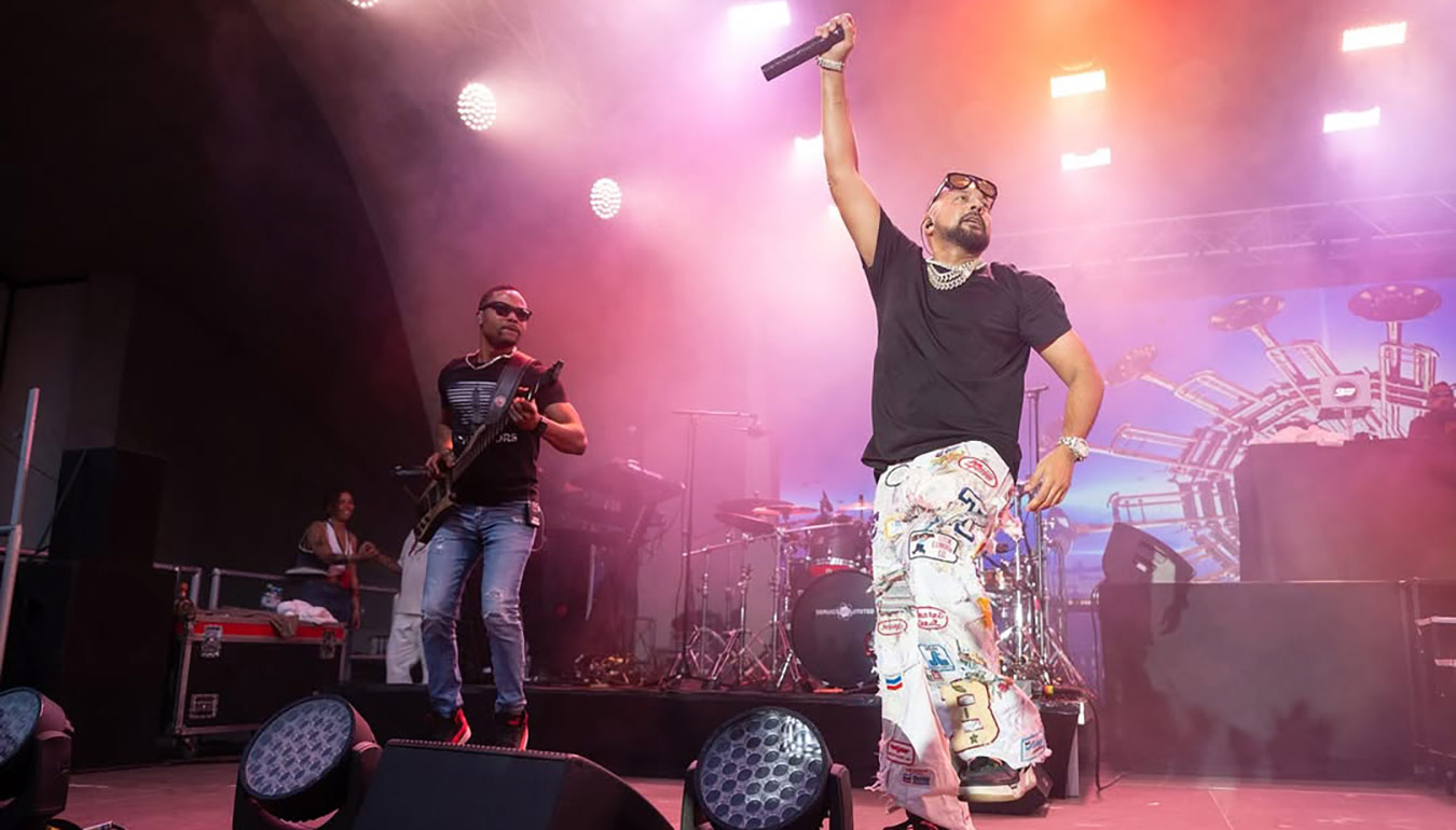 Sean Paul performing on the stage with musicians