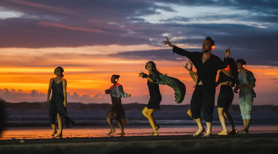 Silent Disco dancers on the beach