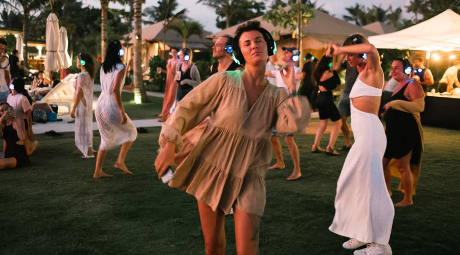 Dancing women on Silent Disco party