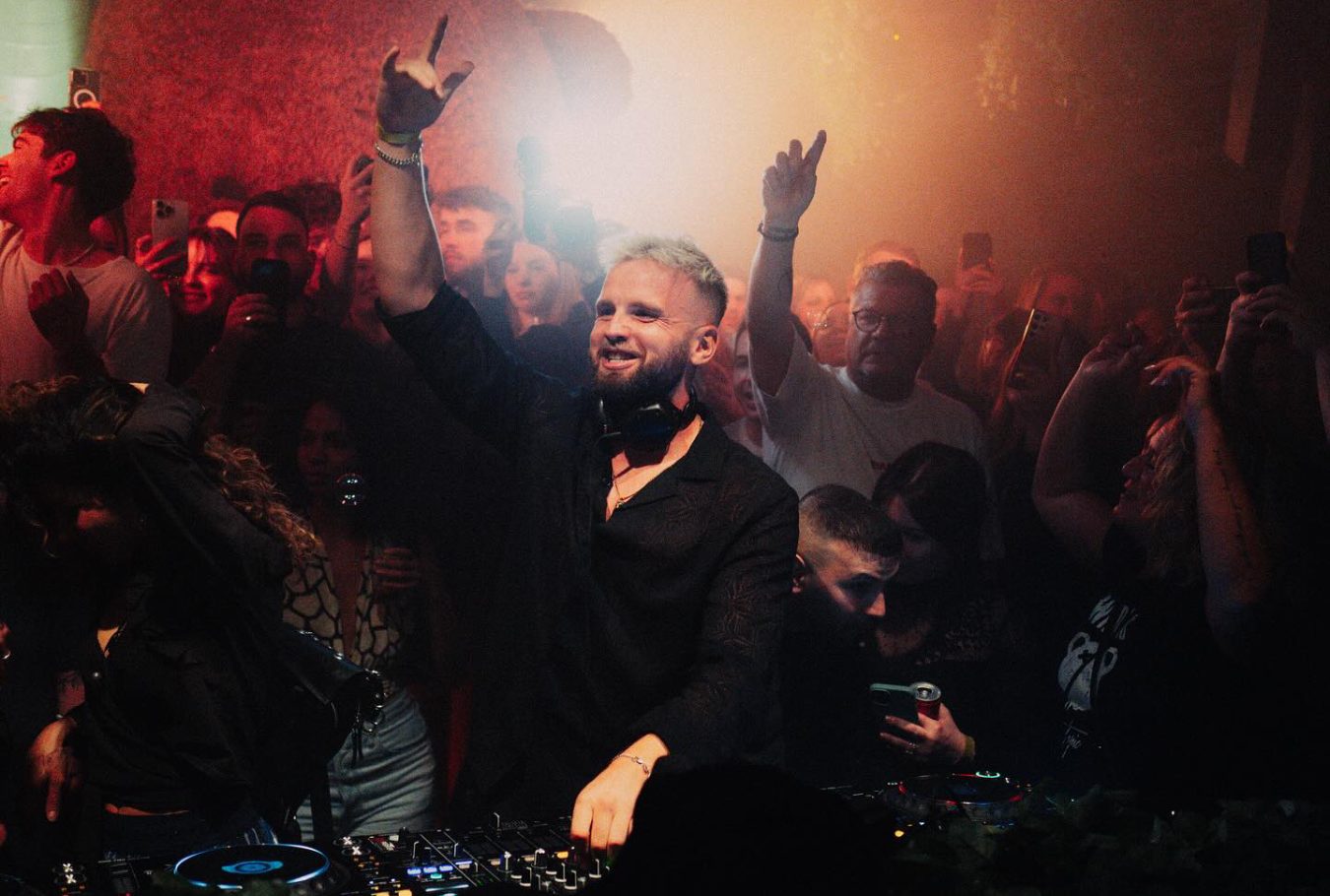 Topic musician in the crowd of night club