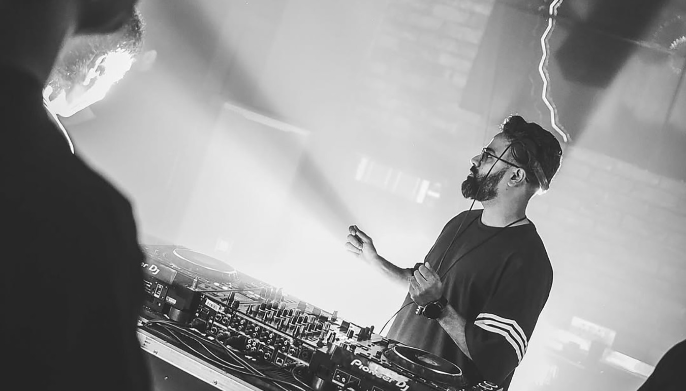 Gibs at the DJ booth in front of an audience