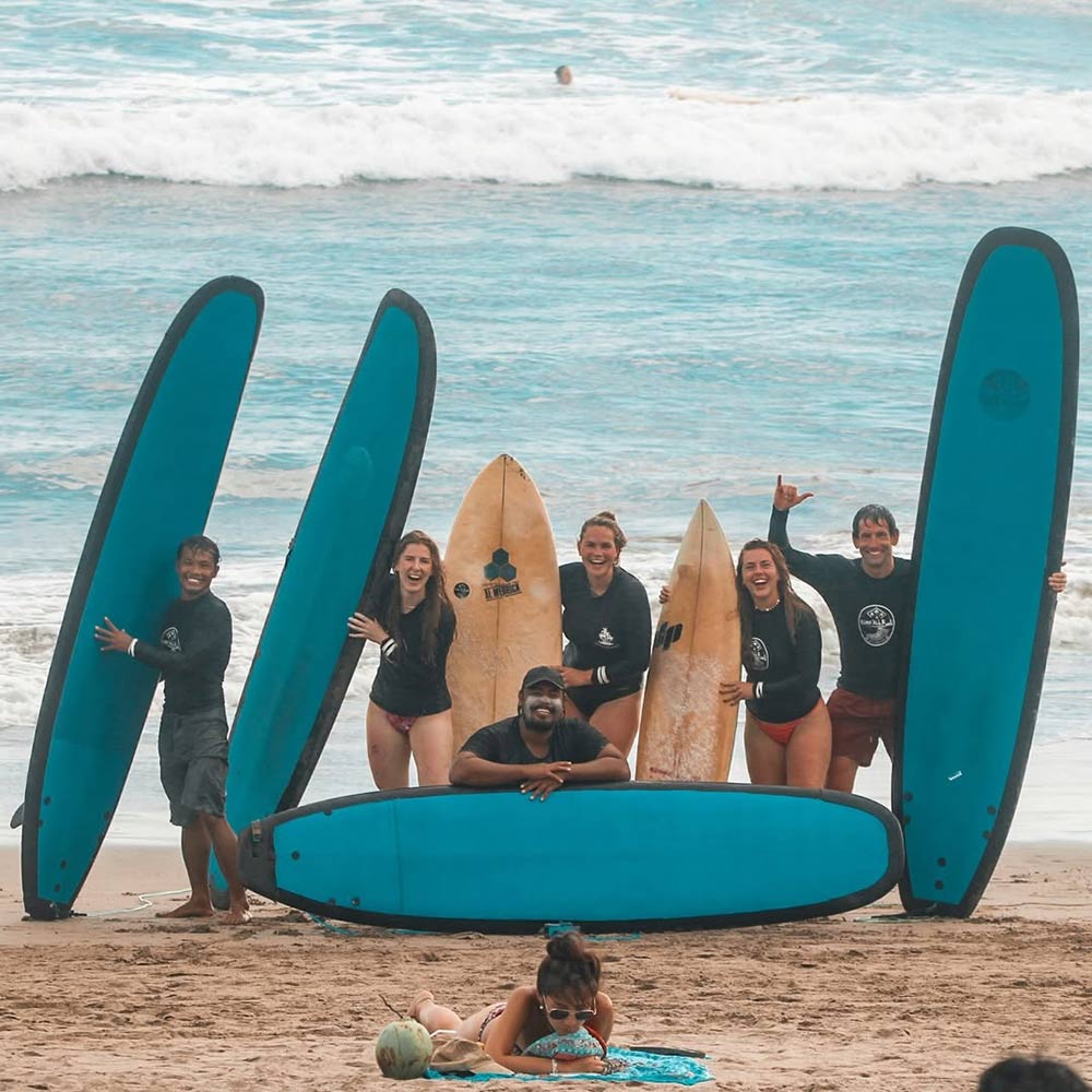 Team of surfers with a teacher on Canggu beach