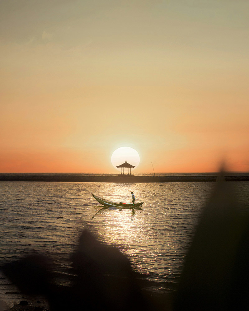 Boat at sunrise in Sanur