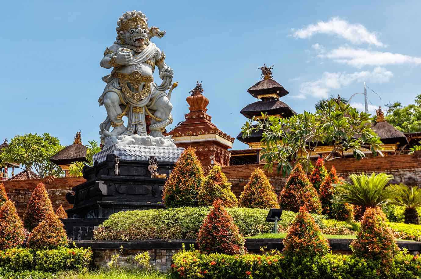 Statues and garden on the area of Petitenget Temple