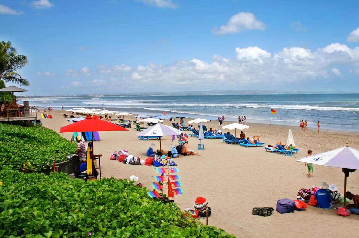 People sunbathing on Seminyak beach