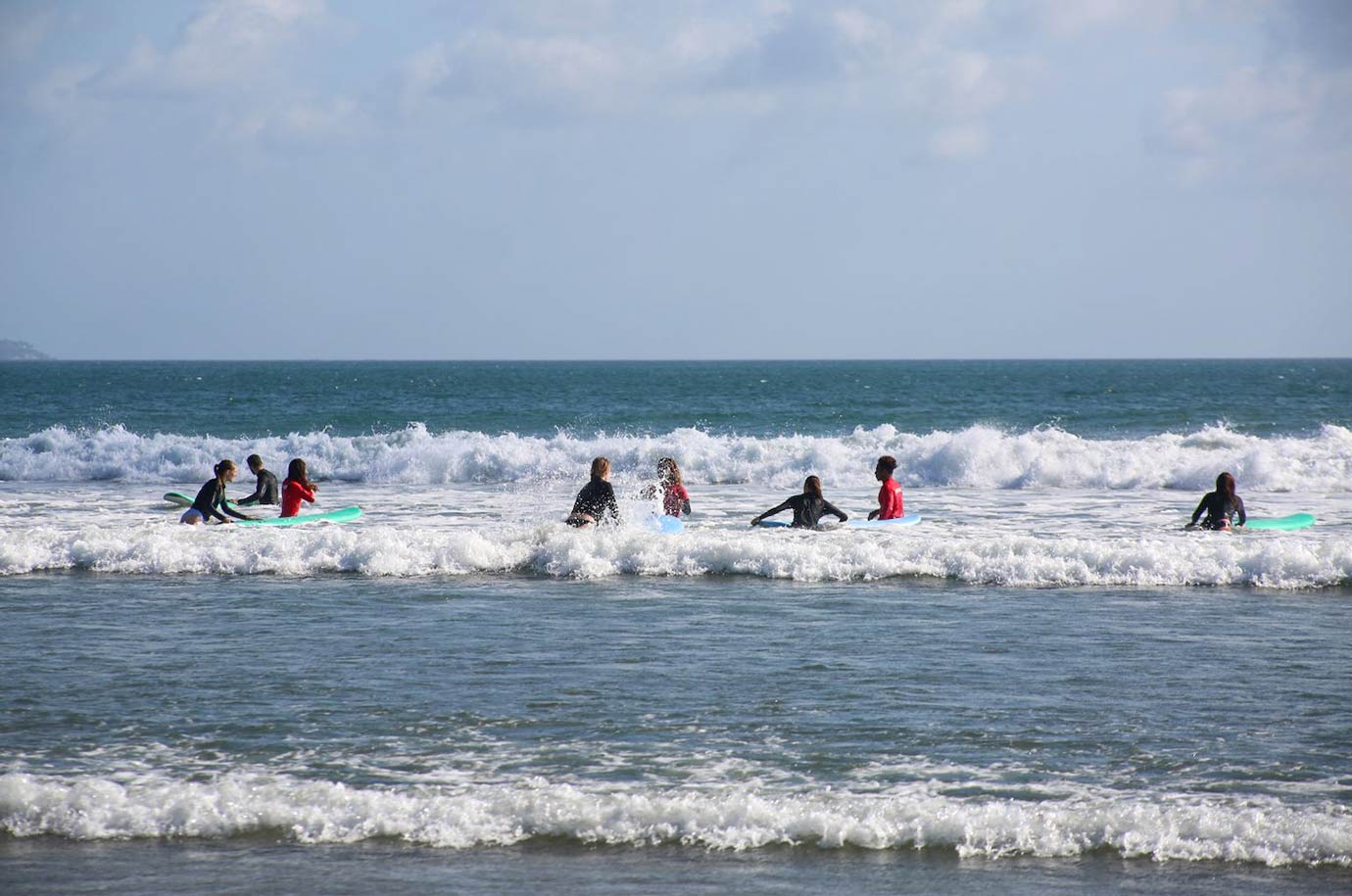 The group of surfers near Seminyak