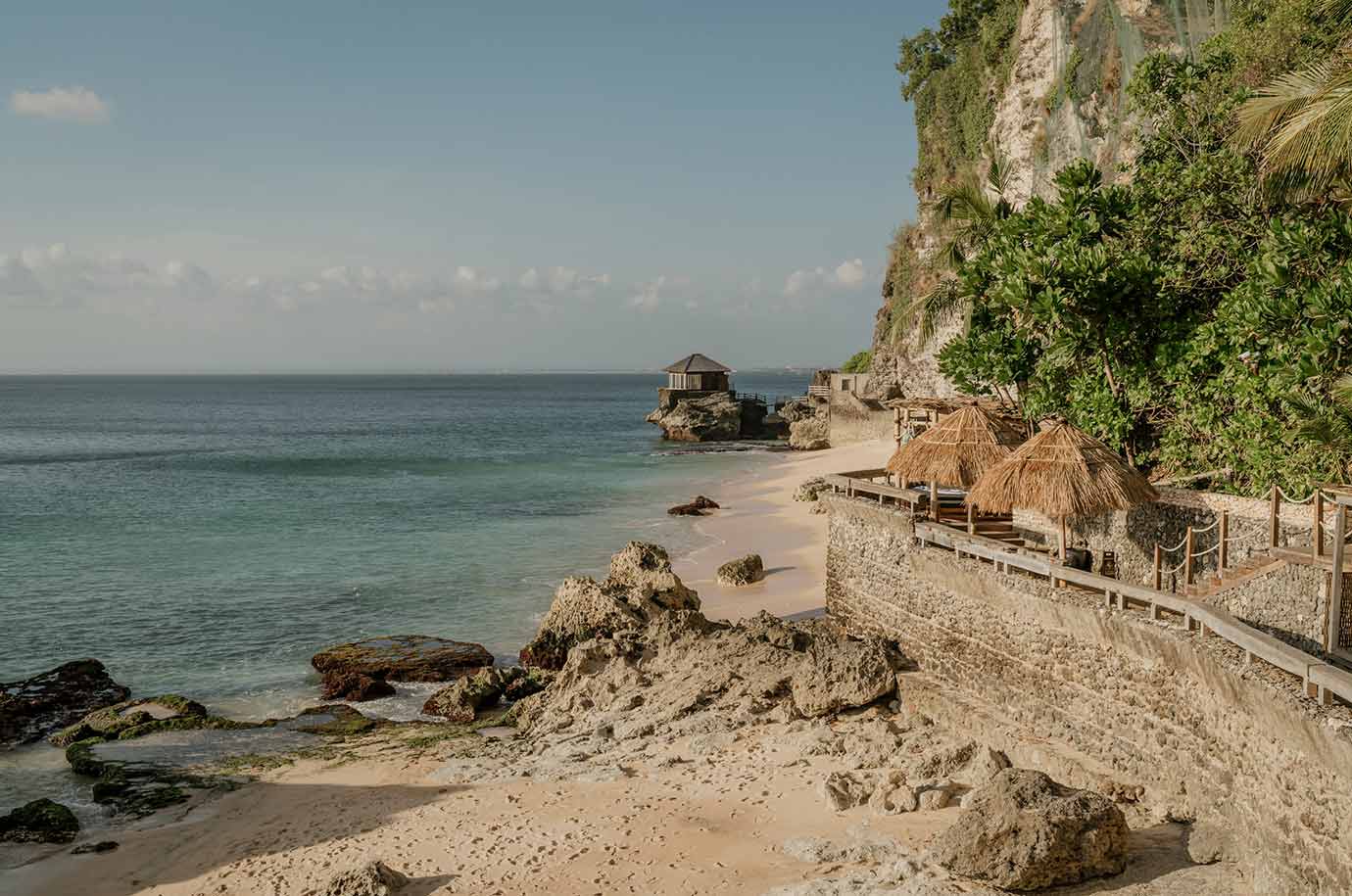 Straw umbrellas on Jimbaran Beach