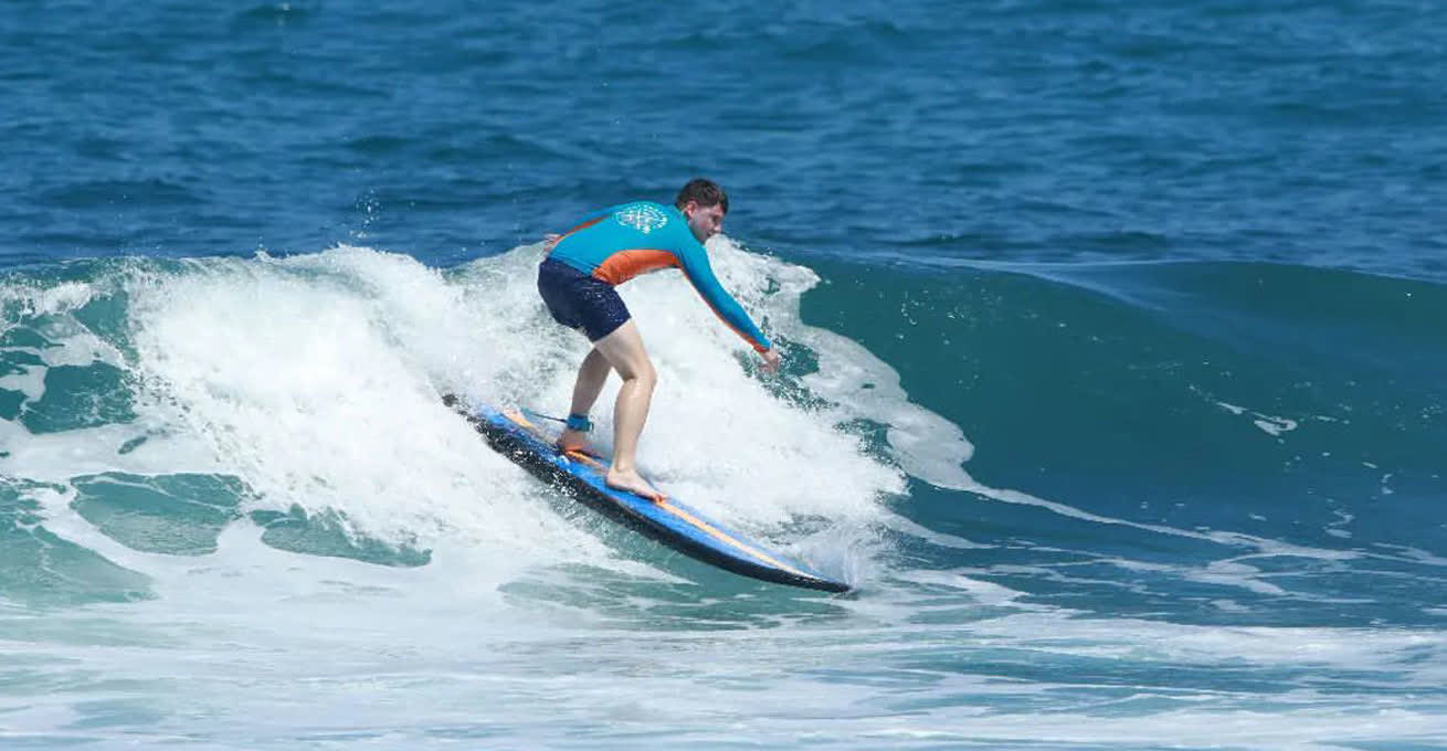 Balangan Wave Surf School - man is taking the classes of surfing