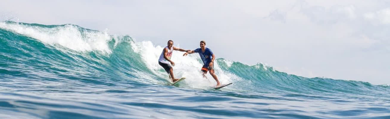 Teacher and student in one of the best Surfing school in Uluwatu