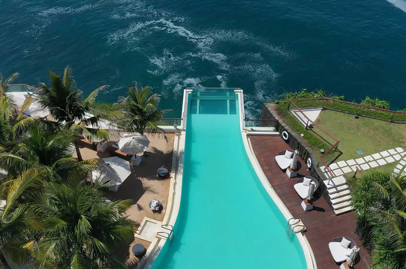 Big swimming pool on the terrace of One Eighty Beach Club