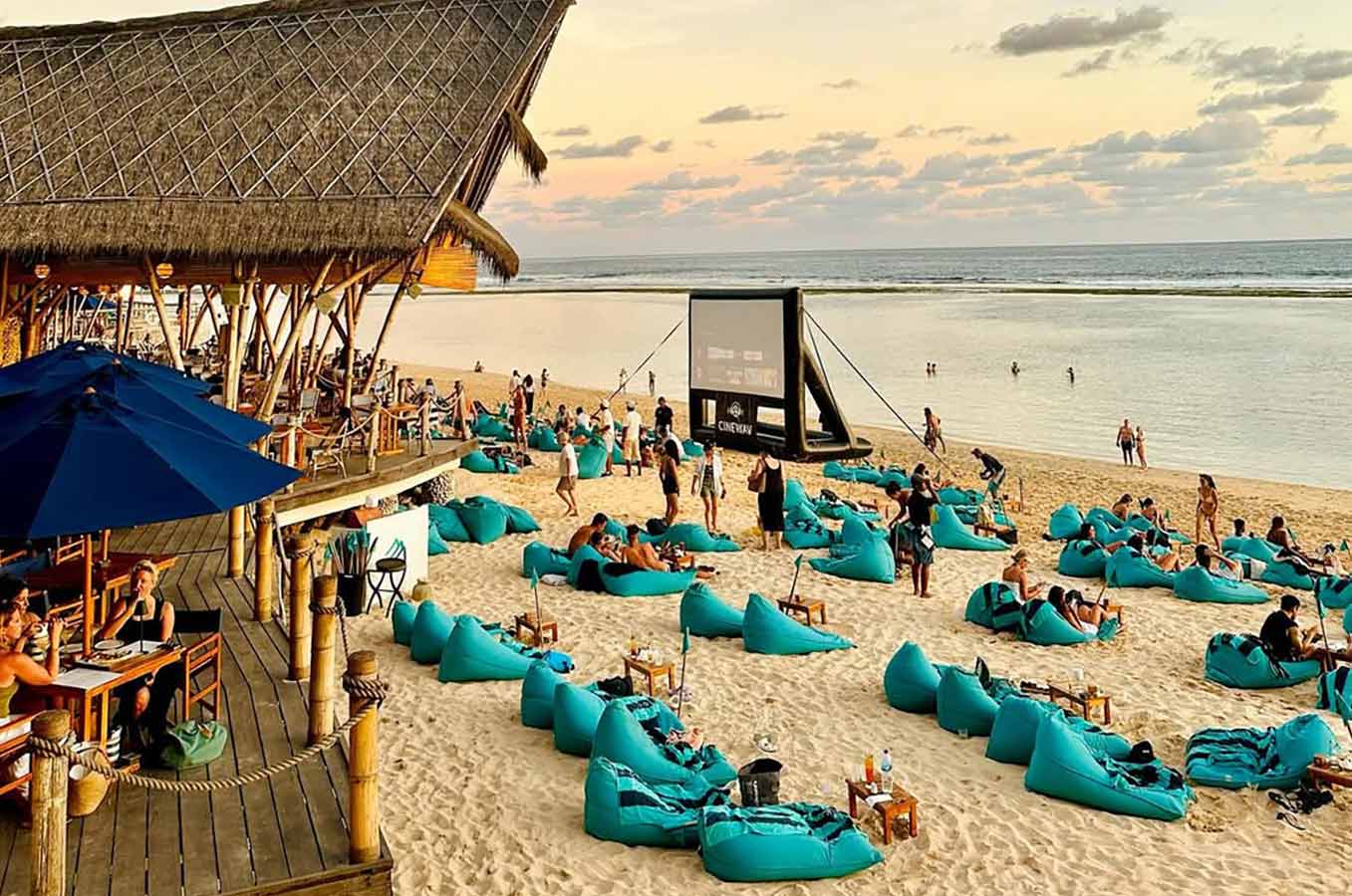 The wooden facade and outdoor cinema at Sundays Beach Club