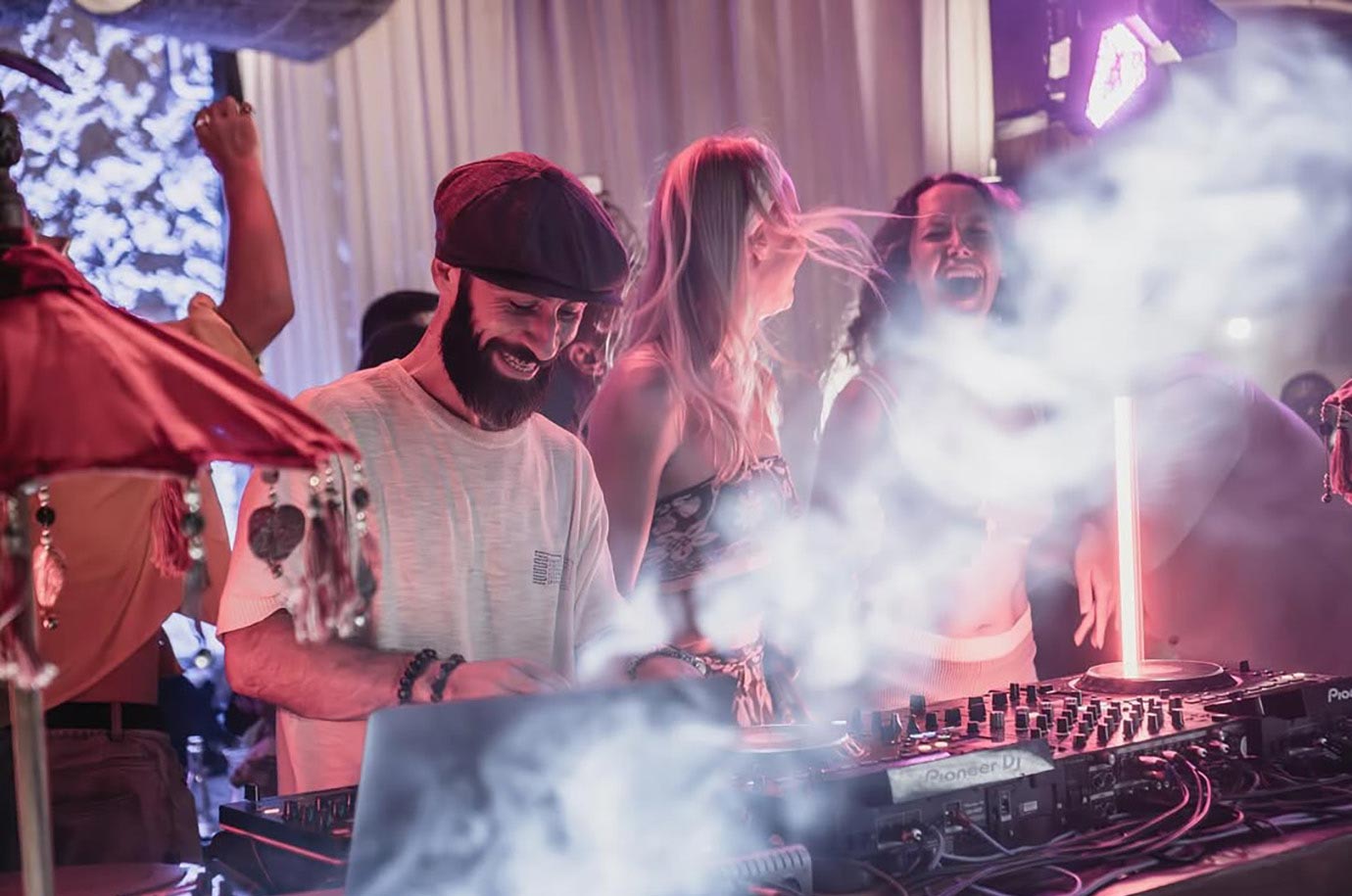 Tropical Temptation - DJ is playing at the DJ booth