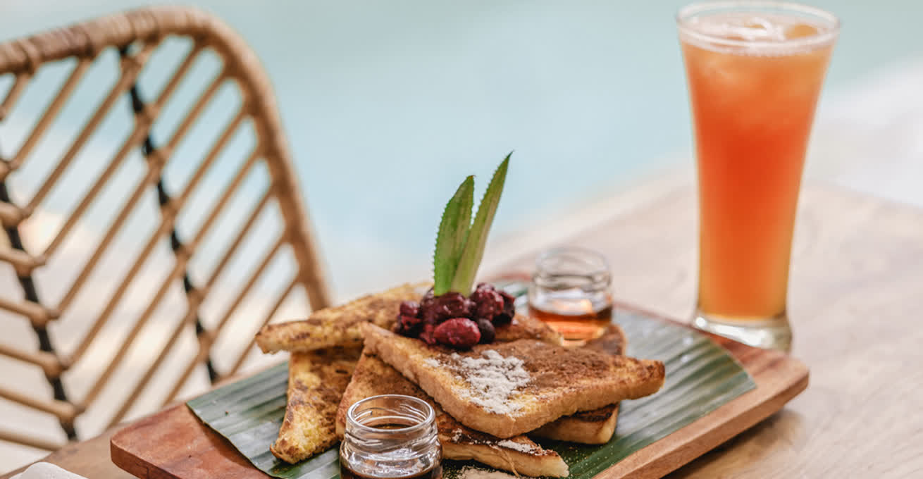 French toast and an orange drink for breakfast in Bali