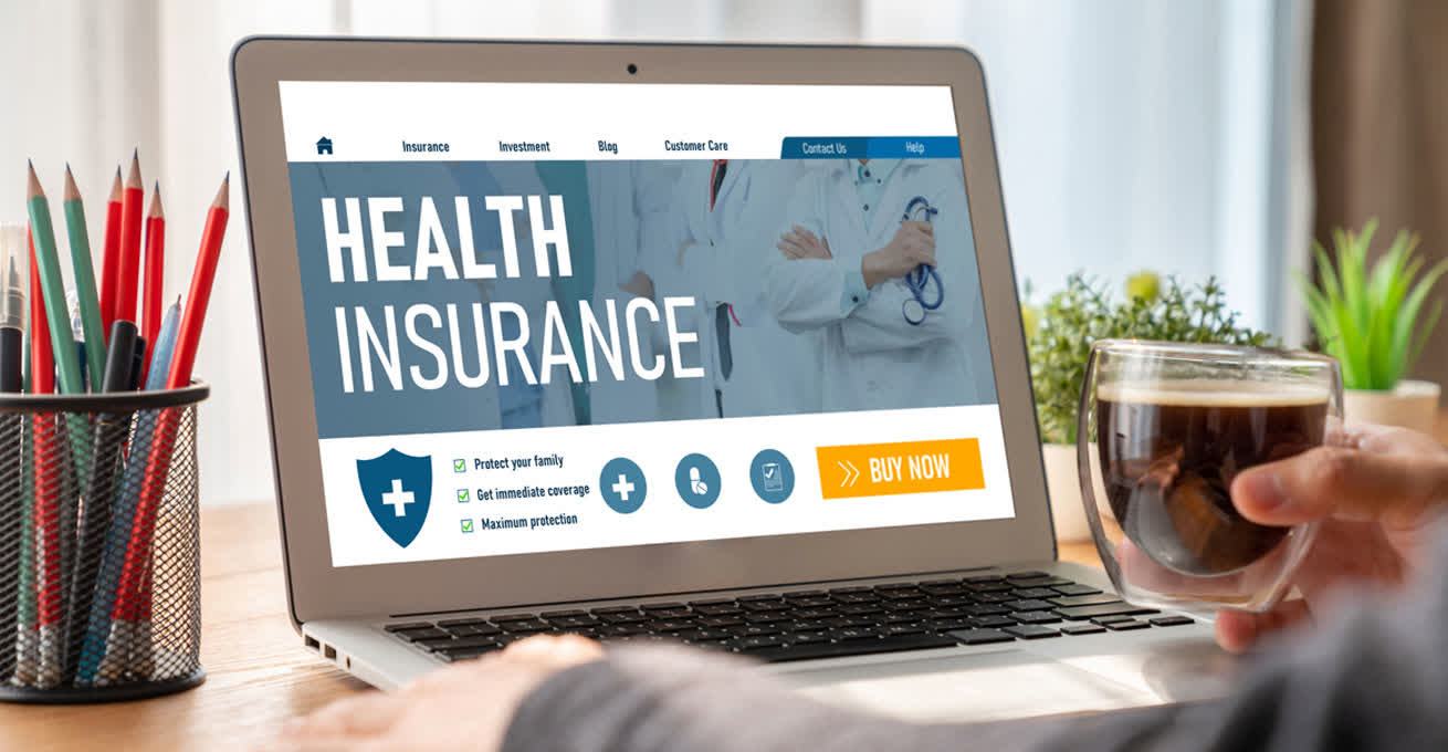 Health insurance page on the laptop screen
