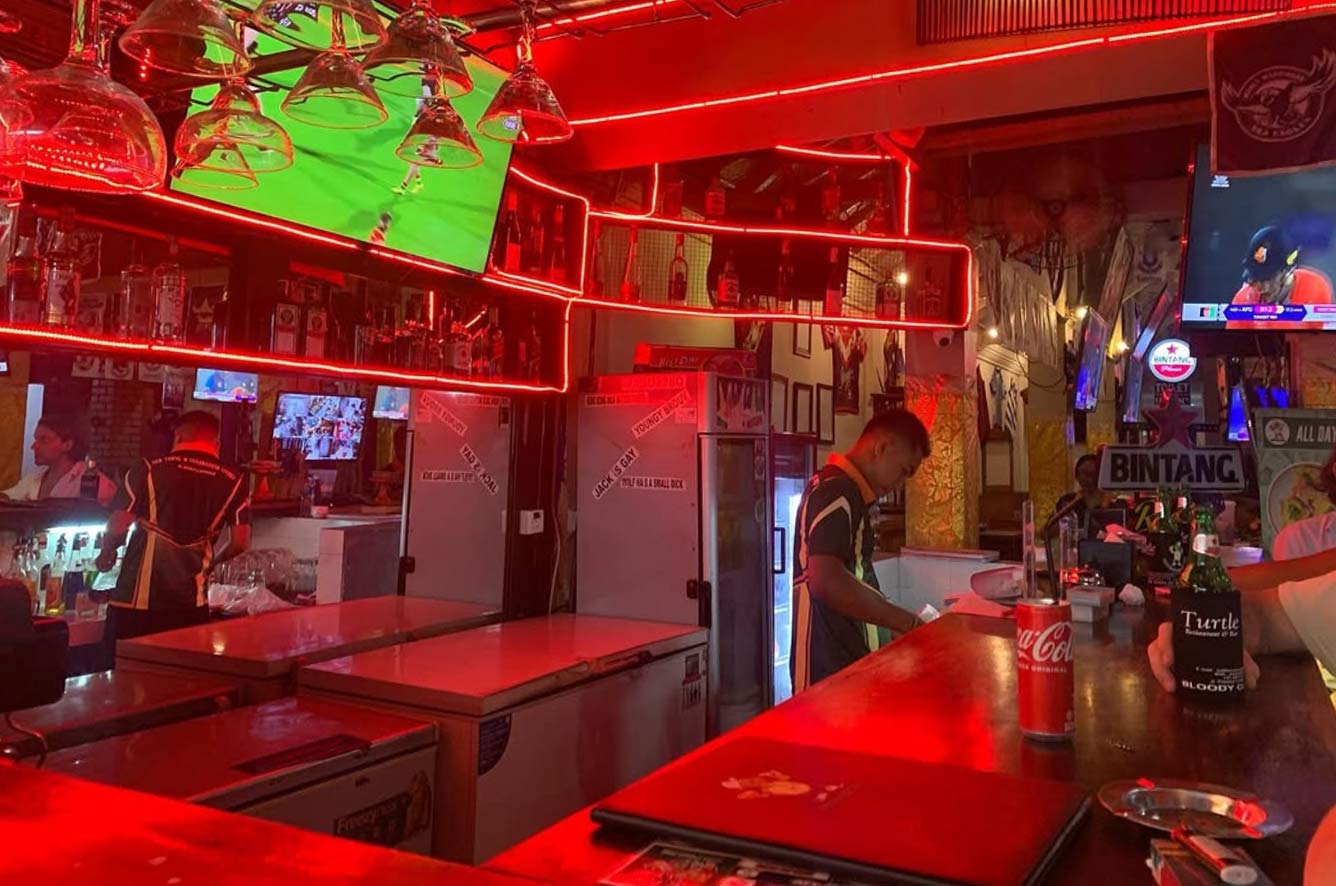 Red illumination in the Turtle Sports Bar