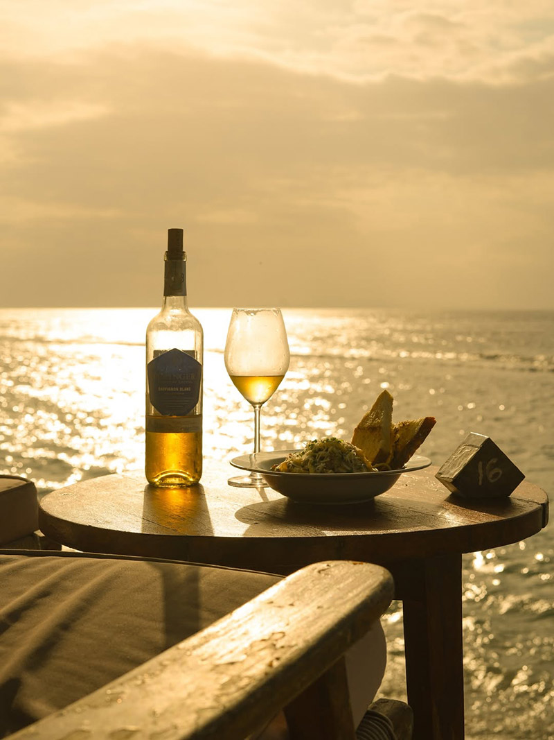 Bottle of wine in front of the sea from Secret Penida Restaurant
