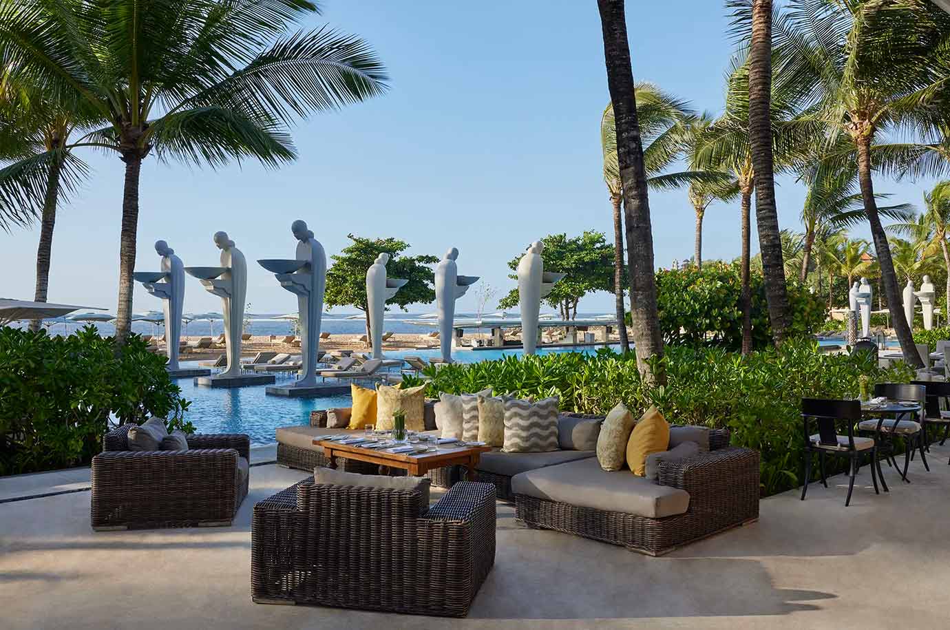 Seats near the beach in Soleil at The Mulia