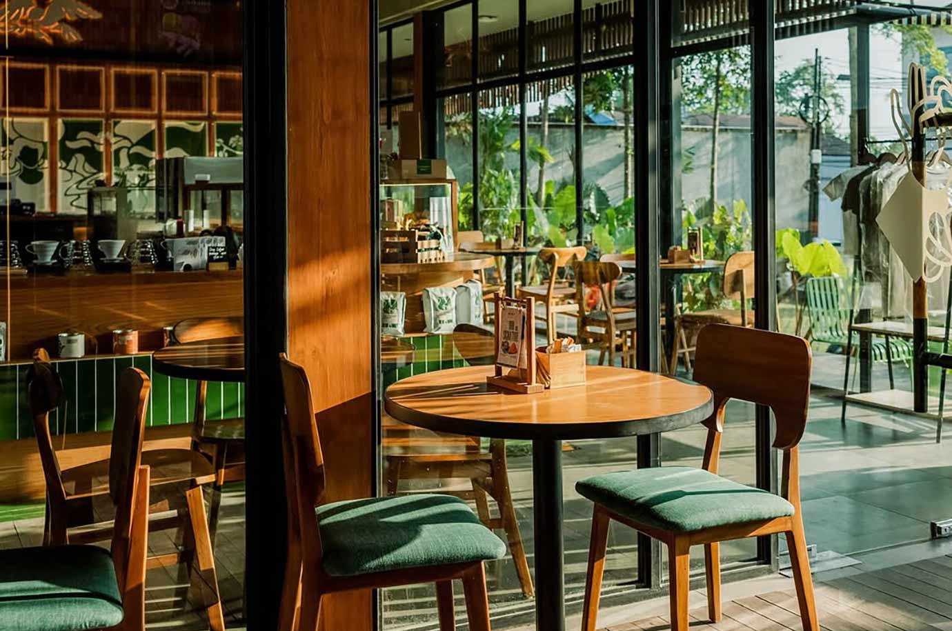 Styled in green and wooden colors room in Livingstone Holyground cafe
