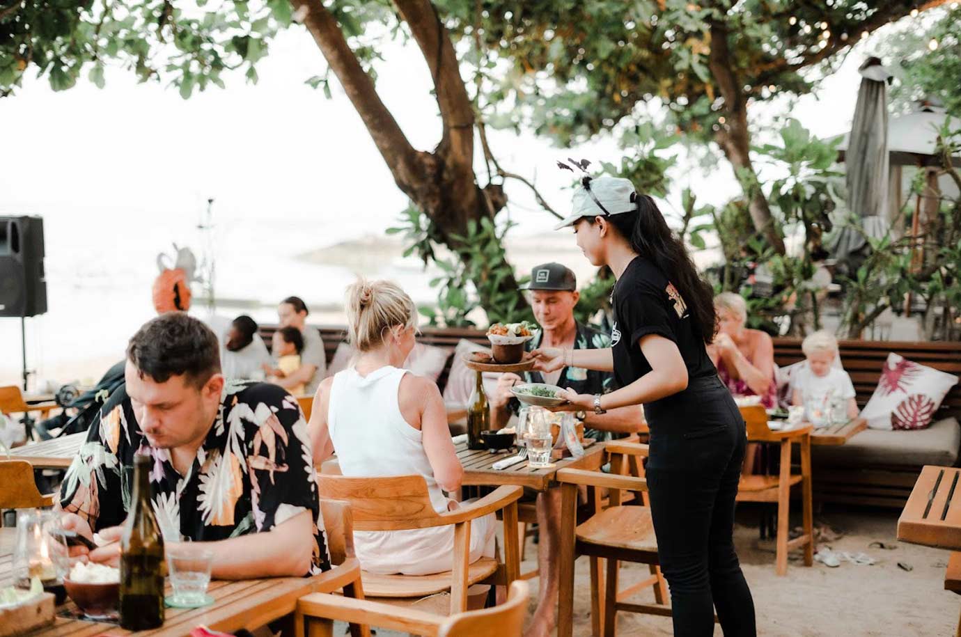 Soul on the Beach - guests at tables right by the beach