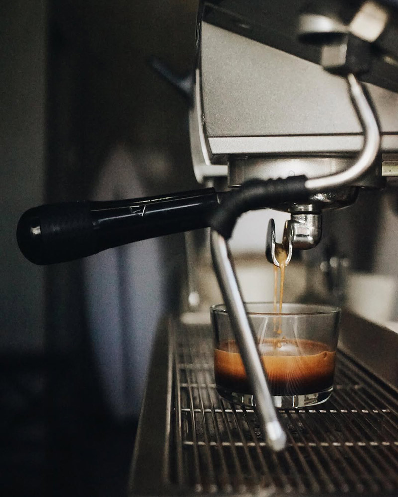 Making coffee with a coffee machine in BGS cafe
