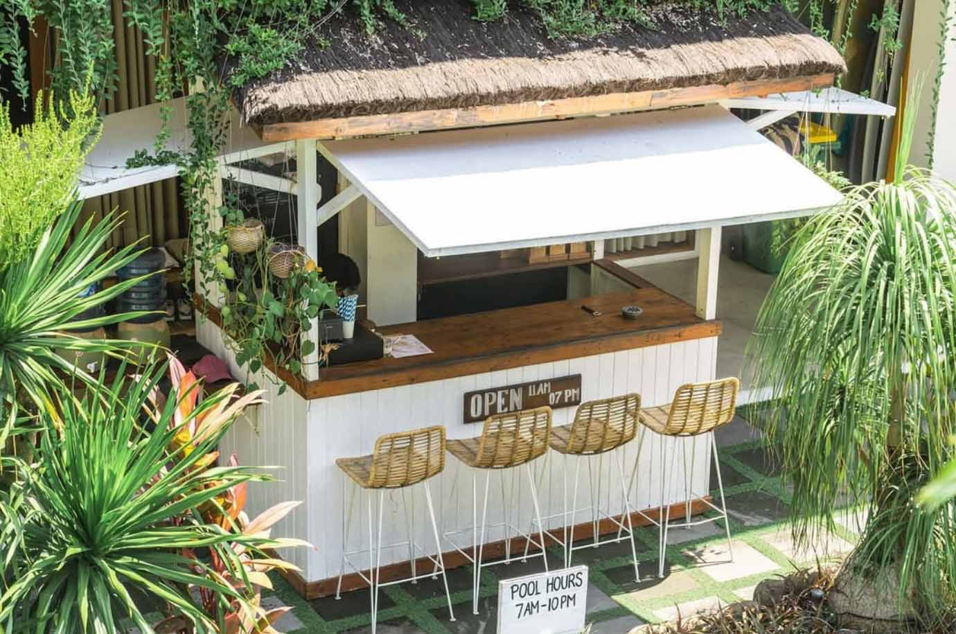 The outdoors of The Farm Hostel in Canggu