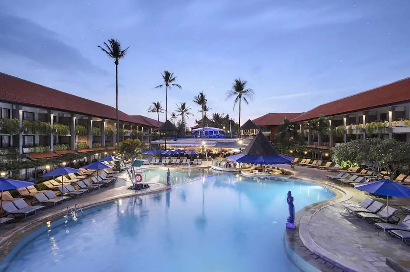 Romantic evening near the pool in Bali Dynasty Resort