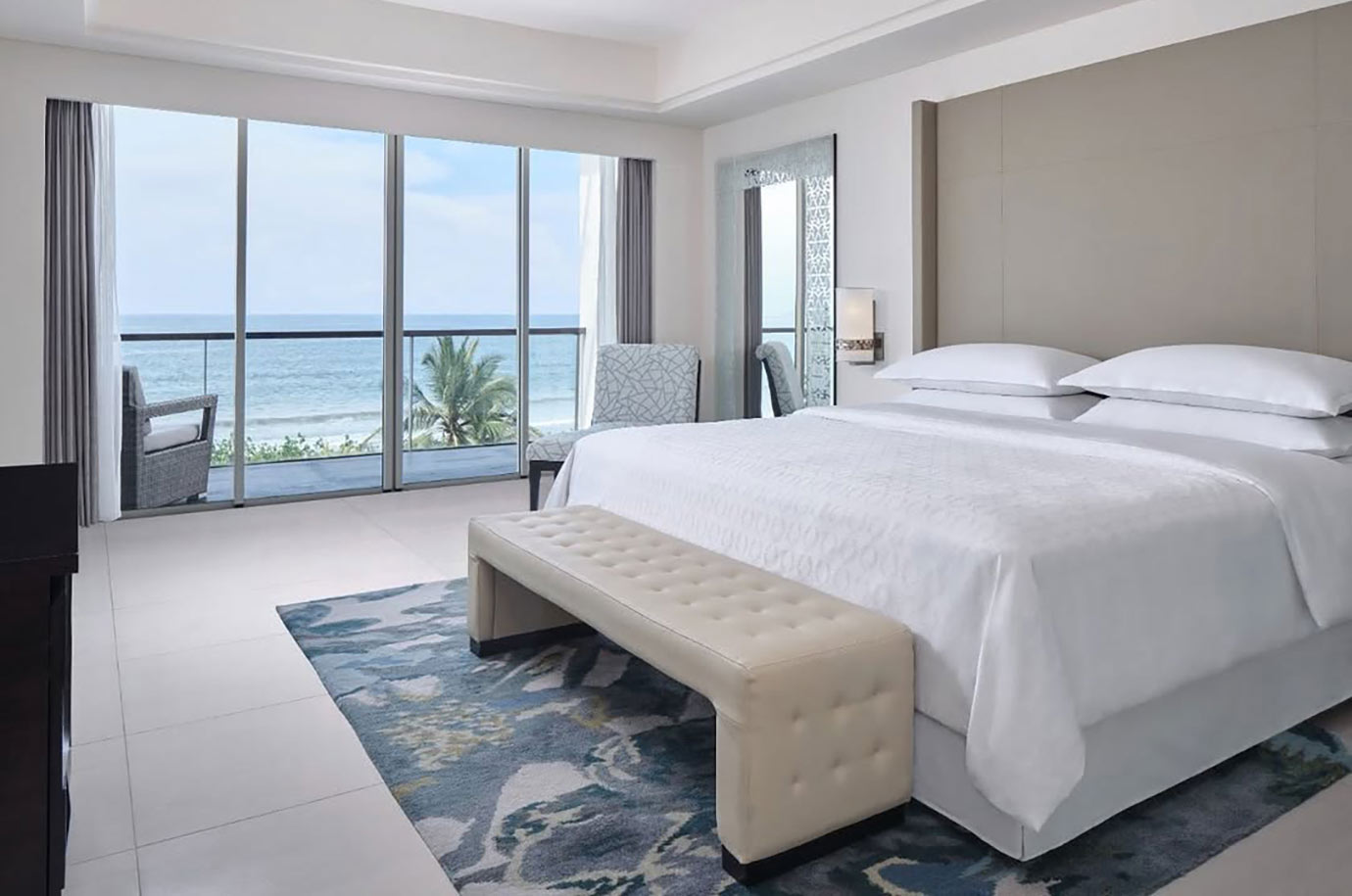 Spacious light interior of Sheraton bedroom with the view