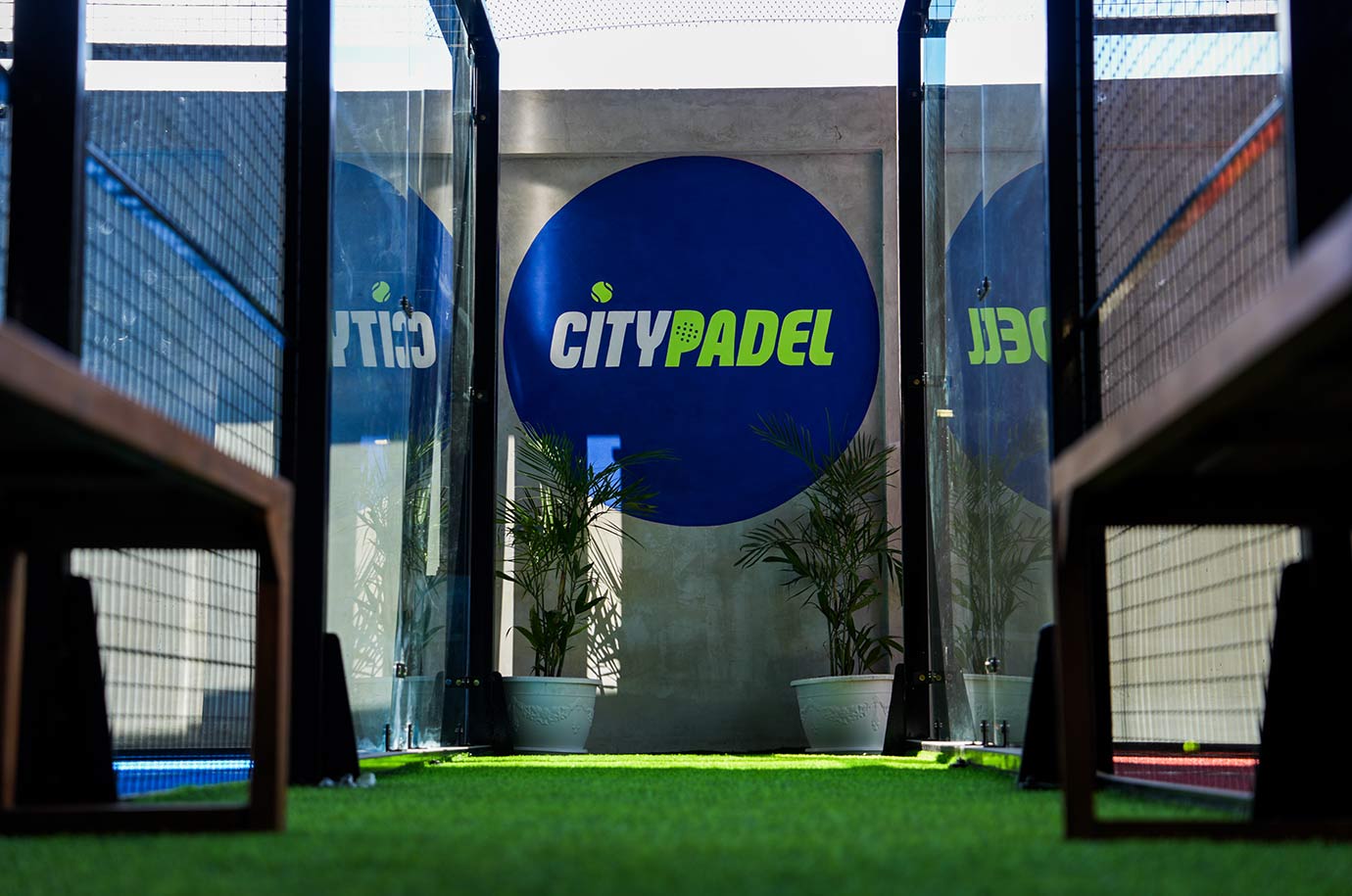 City Padel Bali - logotype on the wall