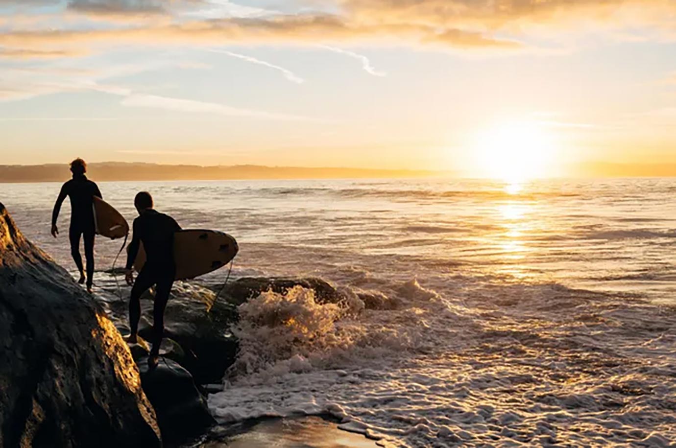 Surfing during the sunrise at Keramas Beach