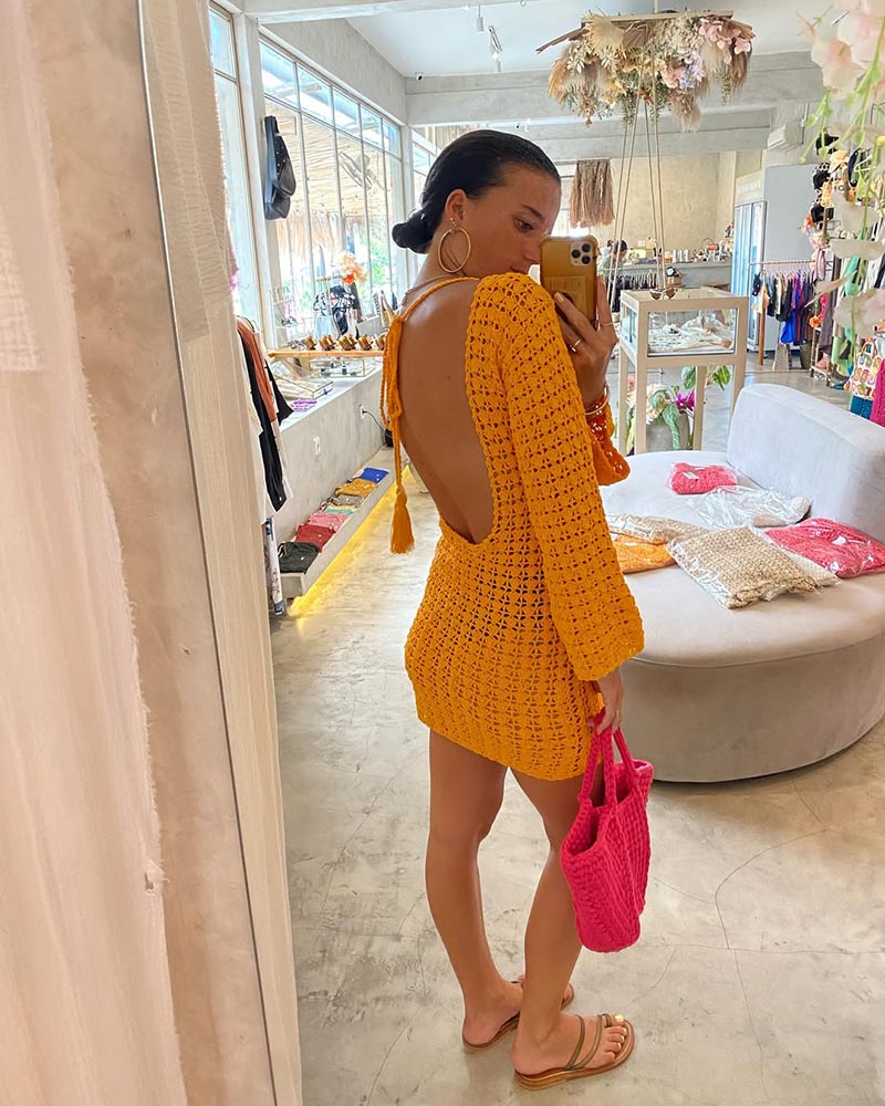 Trying on a dress in Le Concept store