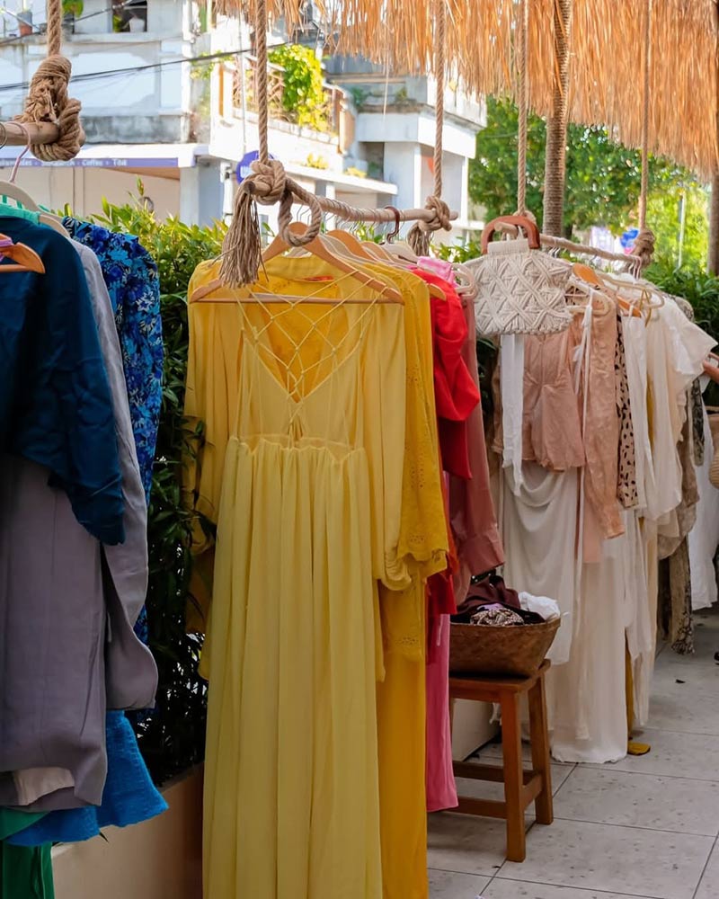 Le Concept store - hangers with clothes