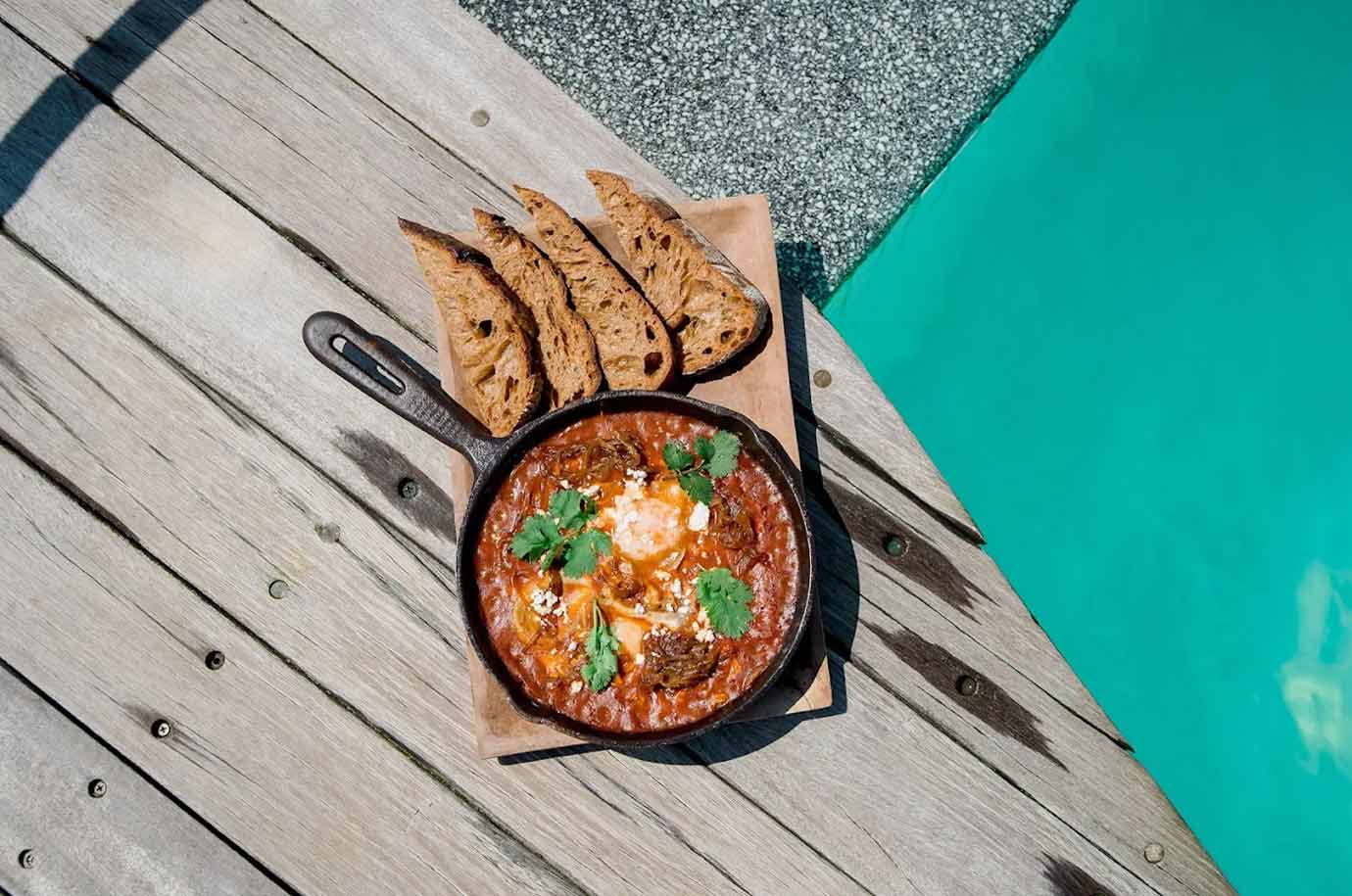 Shakshuka by the pool in The Chill Penida