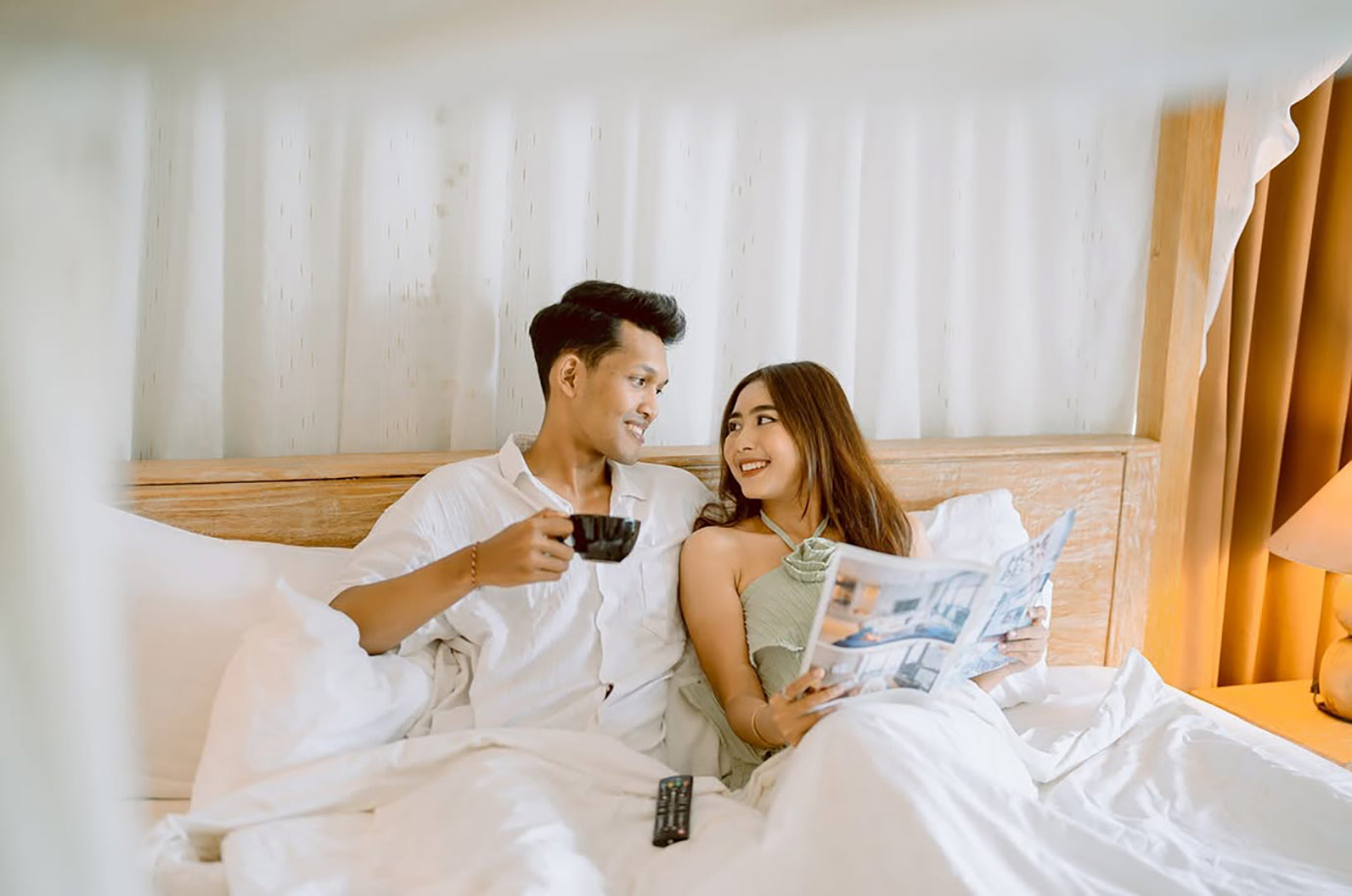 Couple in a bedroom of My Villa and Resort