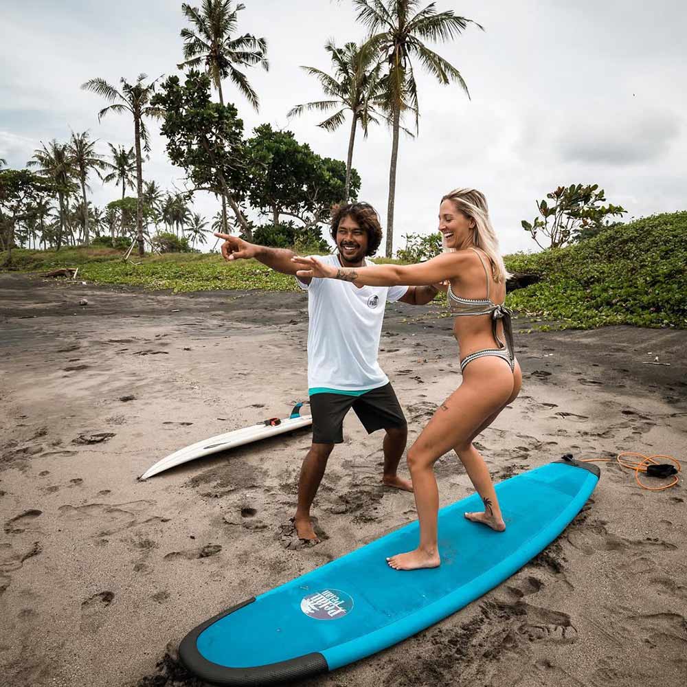 Surfing lessons from Pelan Pelan Bali surfing camp