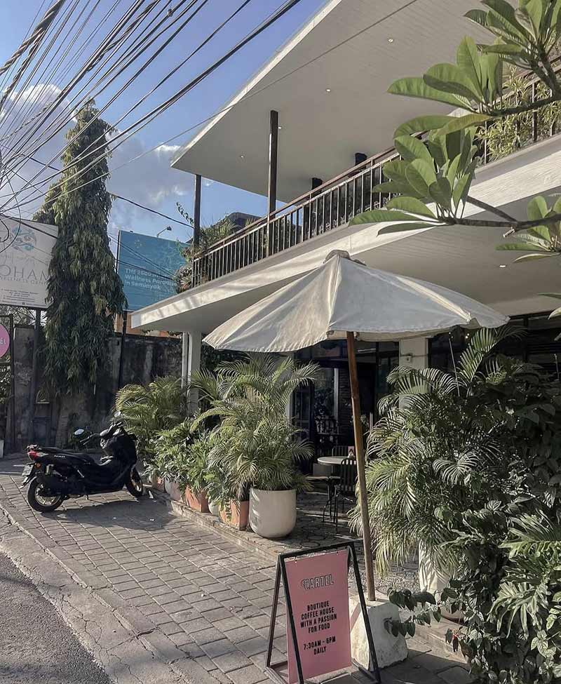 Facade and parking of Coffee Cartel