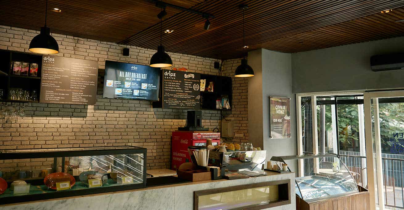 The indoor place and bar counter in Dripz Coffee