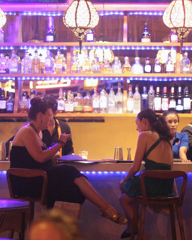 Woman by the bar counter in CP Lounge