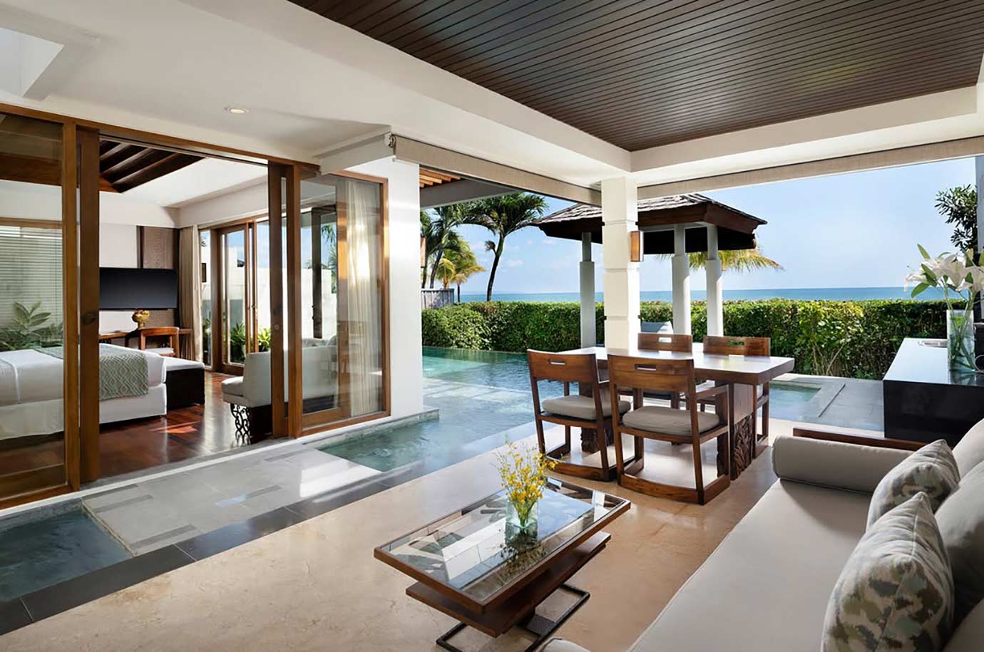 Bedroom and living room of The Seminyak Beach Resort & Spa