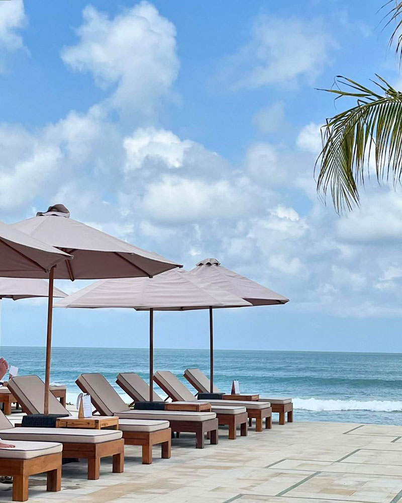 Sunbeds by the beach from The Seminyak Beach Resort & Spa