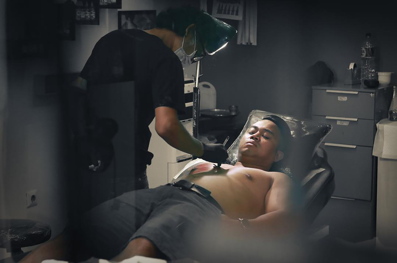Tattooing process in Bali Tattoo Studio Gods of Ink
